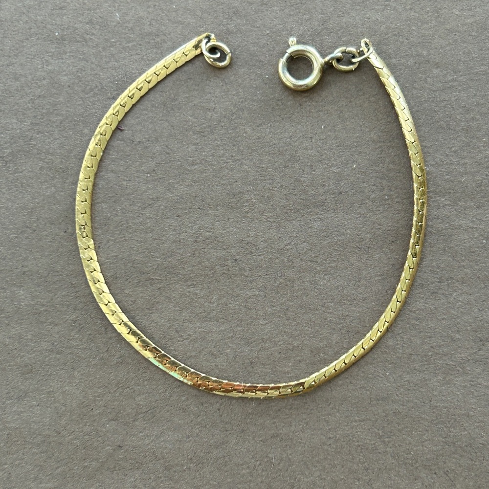 Gold baby bracelet.